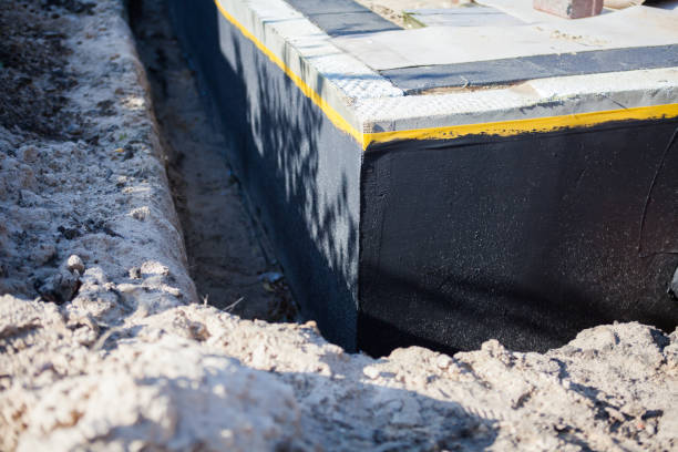 Professional Waterproofing technician working in Warrenville, IL